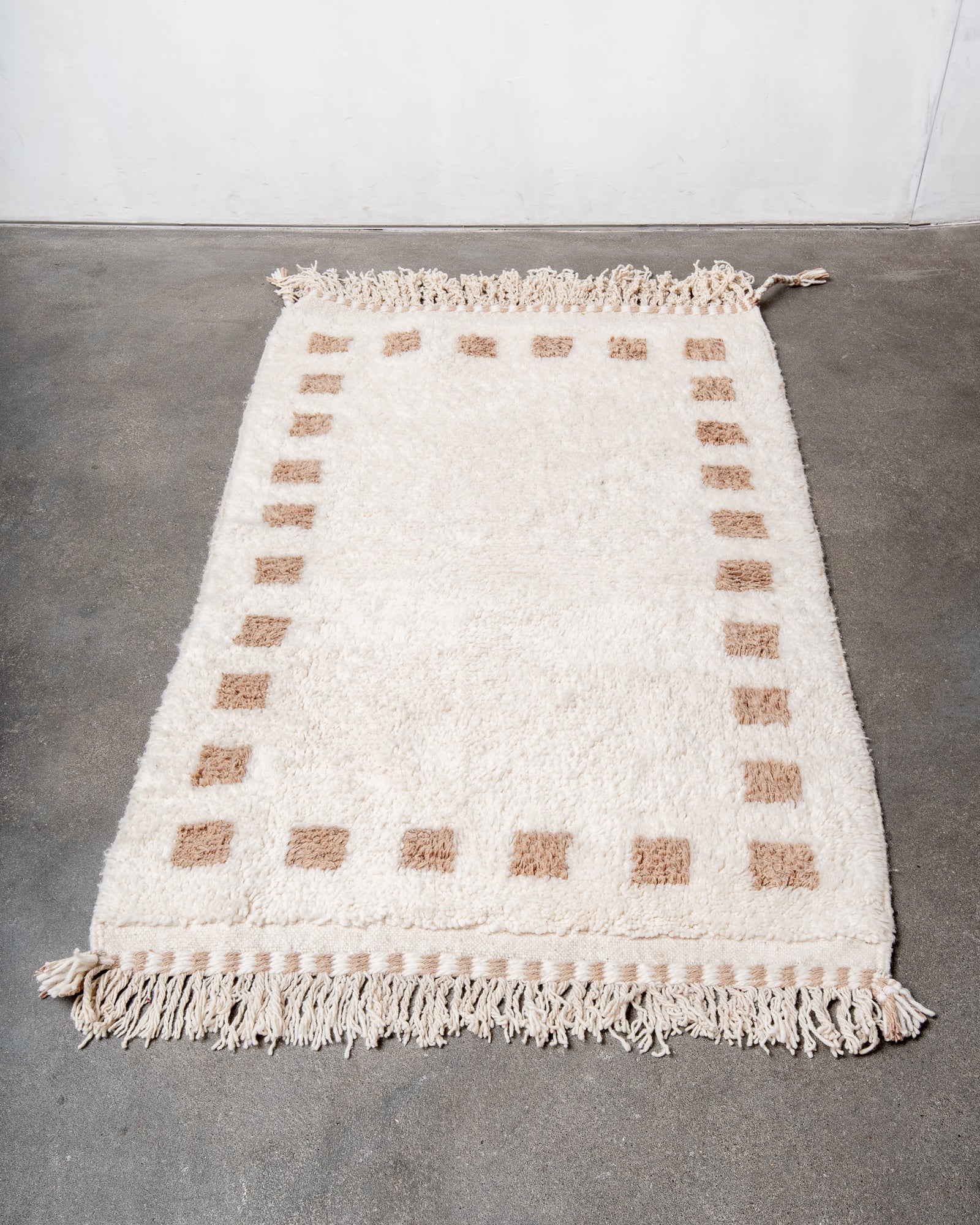 Modern, designer, handcrafted Berber rug from Morocco. Beniourain carpet with beautiful colours and patterns and fluffy wool texture.